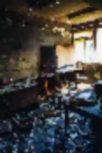Burnt interior of house following fire